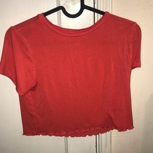 Orange lettuce cut crop top